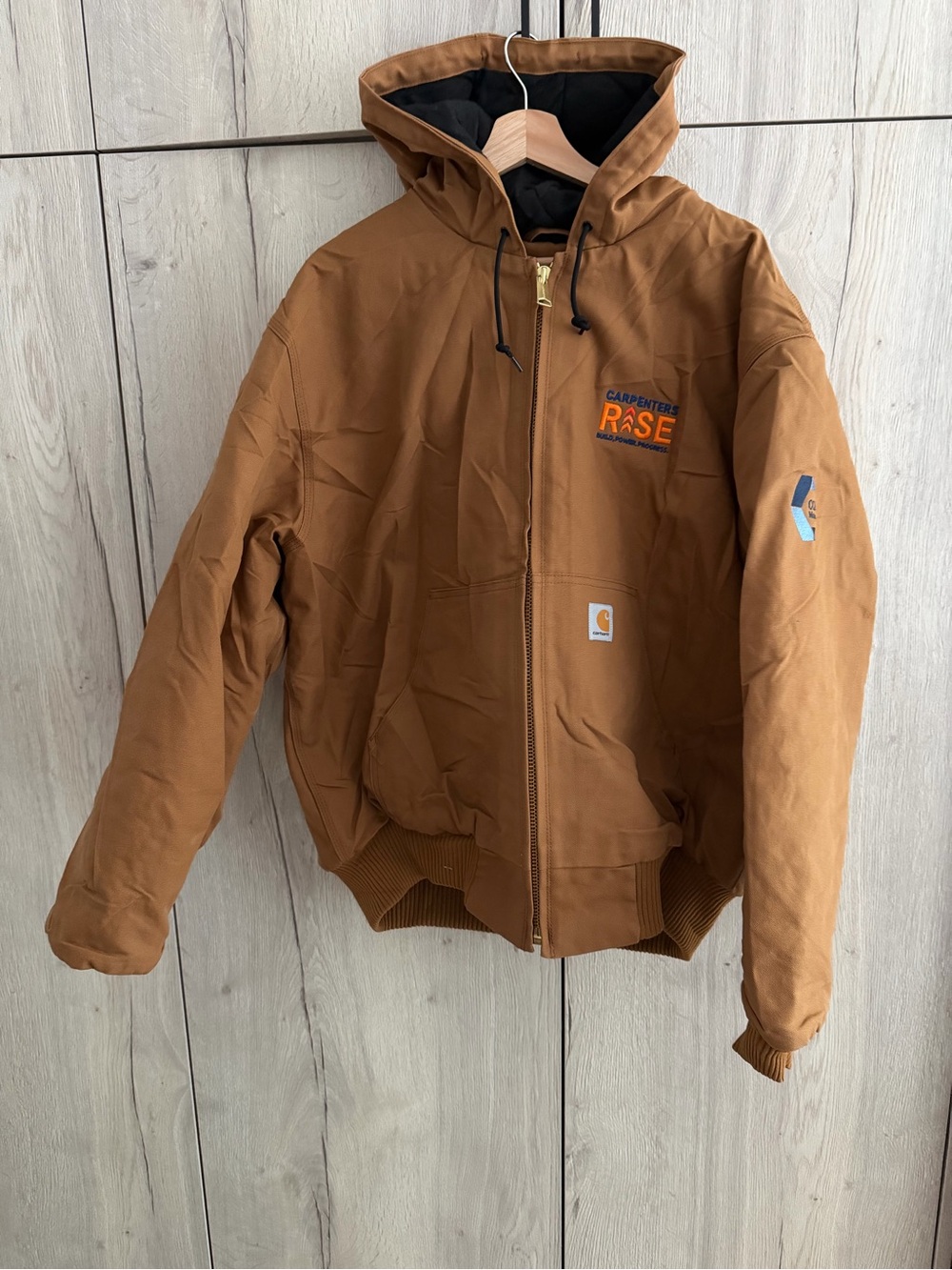 Carhartt hooded jacket with cozy interior liner